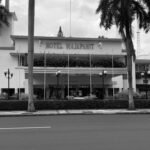 a black and white photo of a hotel in miami